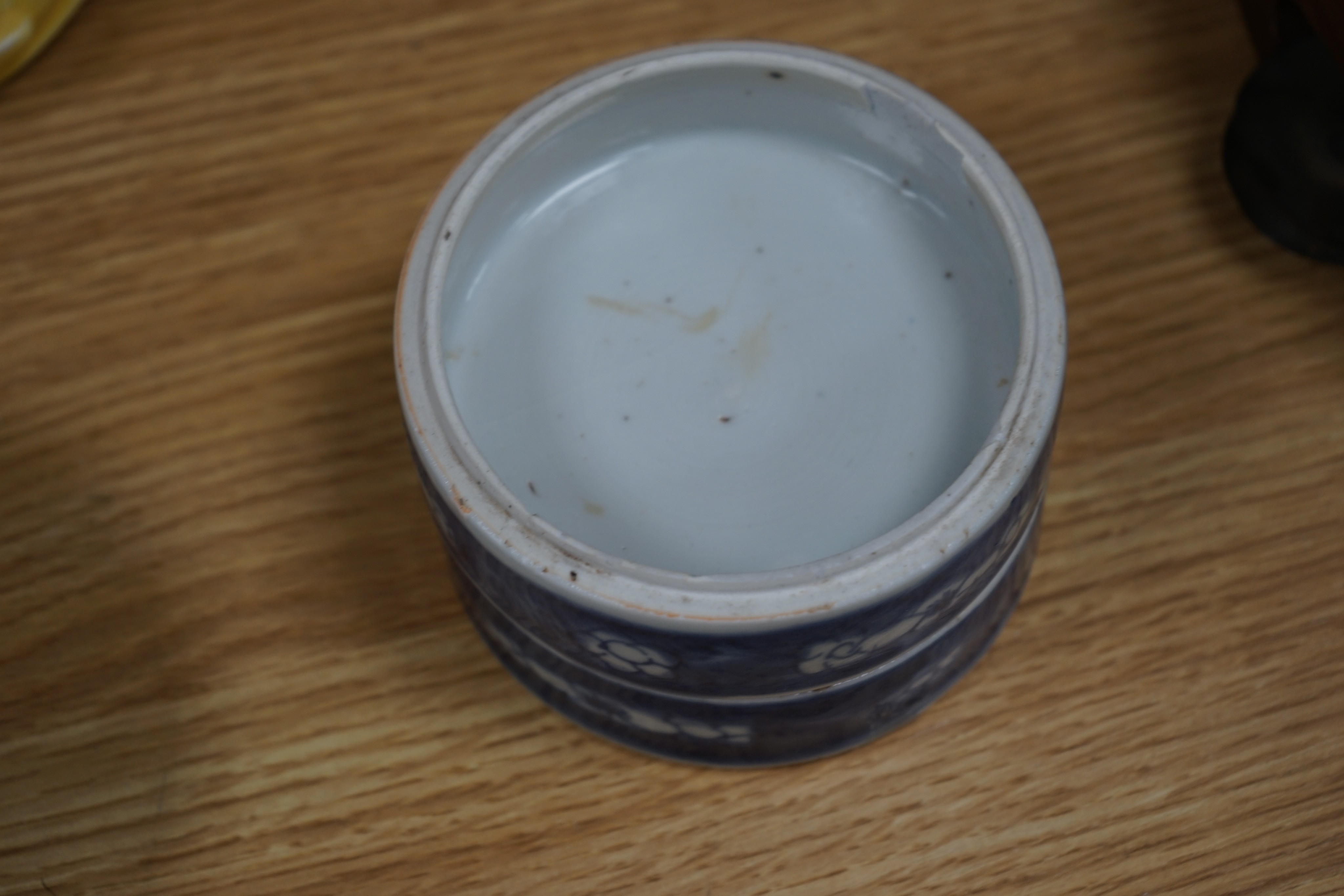 A Chinese blue and white ovoid jar and cover and similar stacking box, Kangxi and a Qing blue and white footed cup, tallest 15cm